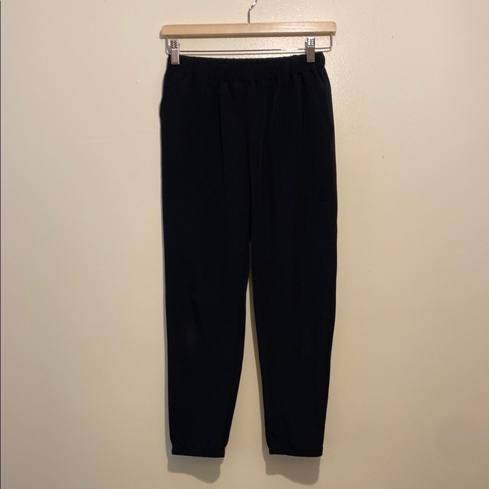 Hatch Black Jogger Style pants with Tapered Leg. Size 0
